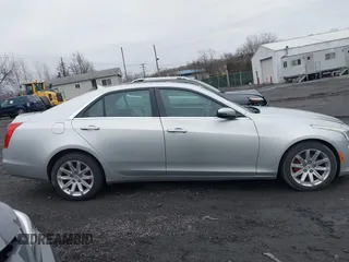 2014 Cadillac CTS Luxury AWD z VIN 1G6AX5SX3E0194895, wystawiony jako IAAI lot #41741824 z przebiegiem 197 042 mil mil oraz . Historia ofert i sprzedaży dostępna na DreamBid. Obrazek 13.