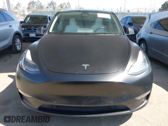2022 Tesla Model Y Performance z VIN 7SAYGDEF0NF491586, wystawiony jako IAAI lot #42276747 z przebiegiem 117 203 mil mil oraz . Historia ofert i sprzedaży dostępna na DreamBid. Obrazek 12.