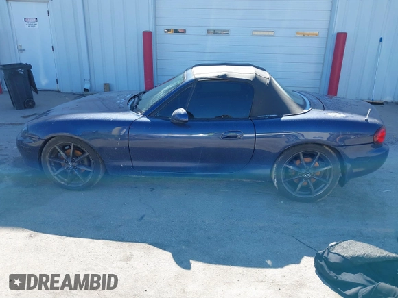2002 Mazda MX-5 Miata Cloth z VIN JM1NB353920234533, wystawiony jako IAAI lot #41735487 z przebiegiem 112 661 mil mil oraz . Historia ofert i sprzedaży dostępna na DreamBid. Obrazek 14.