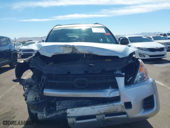 2012 Toyota RAV4 with VIN 2T3ZF4DV2CW153935, listed as a IAAI auction lot 41653384 with 142,341 mi miles. Bid and sale history available at carsss.com. Image 6.