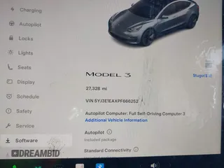 2023 Tesla Model 3 with VIN 5YJ3E1EAXPF666252, listed as a IAAI auction lot 42009929 with 27,328 mi miles and . Bid and sale history available at DreamBid. Image 7.