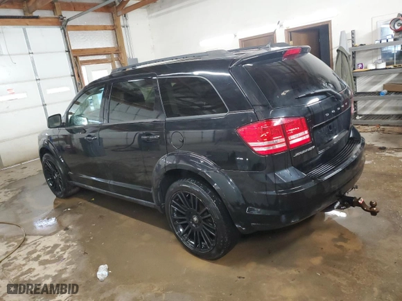 2018 Dodge Journey SE with VIN 3C4PDCAB0JT273187, listed as a Copart auction lot 48561335 with 199,674 mi miles and Clean Title. Bid and sale history available at carsss.com. Image 2.