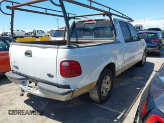 2001 Ford F-150 XLT with VIN 1FTRW07W21KE19926, listed as a IAAI auction lot 42750523 with Not provided miles and . Bid and sale history available at DreamBid. Image 4.