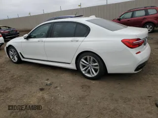 2016 BMW 7 Series 750i with VIN WBA7F0C50GGL99642, listed as a Copart auction lot 64986753 with 69,531 mi miles. Bid and sale history available at carsss.com. Image 2.