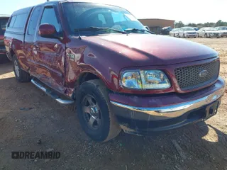 2003 Ford F-150 XL with VIN 1FTRX17W43NA07186, listed as a IAAI auction lot 41864354 with 123,565 mi miles. Bid and sale history available at carsss.com. Image 1.