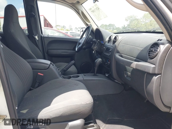 2004 Jeep Liberty Sport with VIN 1J4GK48K54W153217, listed as a IAAI auction lot 42071897 with 106,921 mi miles and . Bid and sale history available at carsss.com. Image 5.