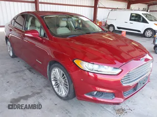 2013 Ford Fusion SE Hybrid z VIN 3FA6P0LU9DR183625, wystawiony jako IAAI lot #42338533 z przebiegiem 159 546 mil mil oraz . Historia ofert i sprzedaży dostępna na DreamBid. Obrazek 1.