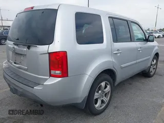 2015 Honda Pilot EX-L with VIN 5FNYF3H68FB001256, listed as a IAAI auction lot 42028966 with 277,927 mi miles and . Bid and sale history available at carsss.com. Image 4.