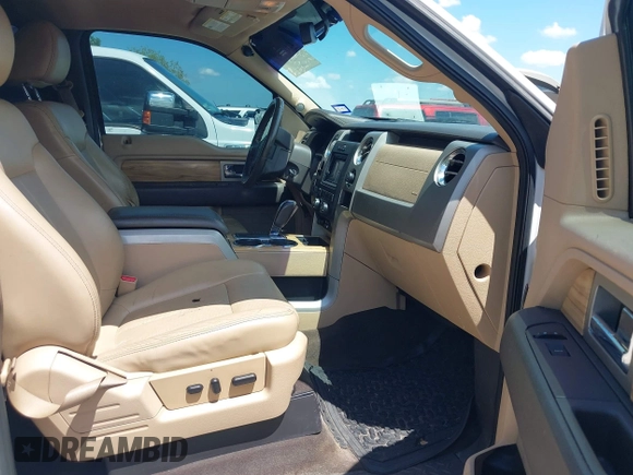 2011 Ford F-150 XLT with VIN 1FTFW1CT7BFA59275, listed as a IAAI auction lot 42111709 with 203,718 mi miles. Bid and sale history available at carsss.com. Image 5.