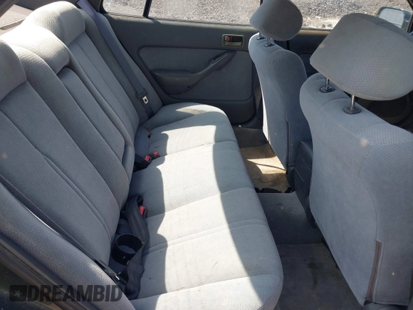1995 Toyota Camry LE z VIN 4T1SK12E3SU576500, wystawiony jako IAAI lot #42186816 z przebiegiem 216 809 mil mil oraz . Historia ofert i sprzedaży dostępna na DreamBid. Obrazek 8.