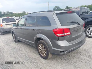 2013 Dodge Journey SXT with VIN 3C4PDCBG7DT568284, listed as a IAAI auction lot 42508928 with 215,803 mi miles and . Bid and sale history available at DreamBid. Image 3.