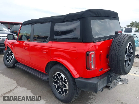 2022 Ford Bronco z VIN 1FMDE5DH7NLA98557, wystawiony jako IAAI lot #41746093 z przebiegiem 61 718 mil mil oraz . Historia ofert i sprzedaży dostępna na DreamBid. Obrazek 3.