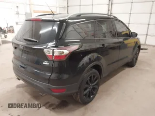 2017 Ford Escape SE with VIN 1FMCU9G98HUE31244, listed as a IAAI auction lot 40985971 with 88,067 mi miles. Bid and sale history available at carsss.com. Image 4.