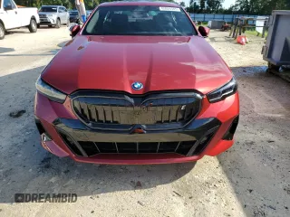 2024 BMW i5 eDrive40 with VIN WBY33FK01RCR76500, listed as a Copart auction lot 65026585 with 3,601 mi miles and Salvage title. Bid and sale history available at DreamBid. Image 5.