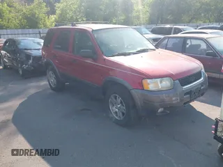 2004 Ford Escape XLT with VIN 1FMYU93114KB38538, listed as a IAAI auction lot 42678317 with 180,106 mi miles and . Bid and sale history available at DreamBid. Image 1.