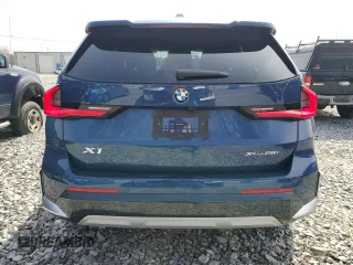 2023 BMW X1 xDrive28i with VIN WBX73EF05P5Y21721, listed as a Copart auction lot 50749295 with 10,633 mi miles and Salvage title. Bid and sale history available at DreamBid. Image 6.