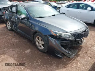 2015 Kia Optima LX z VIN KNAGM4A73F5639519, wystawiony jako IAAI lot #42266700 z przebiegiem 131 101 mil mil oraz . Historia ofert i sprzedaży dostępna na DreamBid. Obrazek 1.
