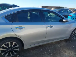 2018 Nissan Altima S with VIN 1N4AL3AP2JC239743, listed as a IAAI auction lot 41683606 with 141,354 mi miles and . Bid and sale history available at DreamBid. Image 13.