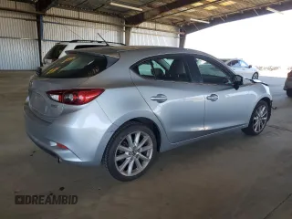 2017 Mazda 3 Touring with VIN 3MZBN1L79HM113024, listed as a Copart auction lot 55831015 with 102,267 mi miles and Salvage title. Bid and sale history available at DreamBid. Image 3.