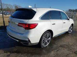 2020 Acura MDX w/Technology Pkg with VIN 5J8YD3H58LL003158, listed as a IAAI auction lot 41532982 with 125,585 mi miles. Bid and sale history available at carsss.com. Image 4.