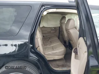 2009 Cadillac Escalade z VIN 1GYFC23249R116363, wystawiony jako IAAI lot #39887498 z przebiegiem 140 095 mil mil oraz . Historia ofert i sprzedaży dostępna na DreamBid. Obrazek 8.
