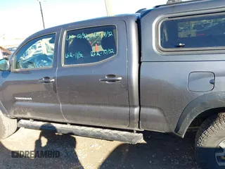 2021 Toyota Tacoma 4WD SR5 with VIN 5TFDZ5BN8MX058531, listed as a IAAI auction lot 41628820 with 102,004 mi miles. Bid and sale history available at carsss.com. Image 14.
