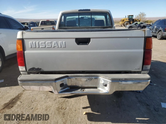 1996 Nissan Frontier XE z VIN 1N6SD11Y5TC327761, wystawiony jako Copart lot #79662594 z przebiegiem 151 631 mil mil oraz Szkoda całkowita • Salvage title. Historia ofert i sprzedaży dostępna na DreamBid. Obrazek 6.