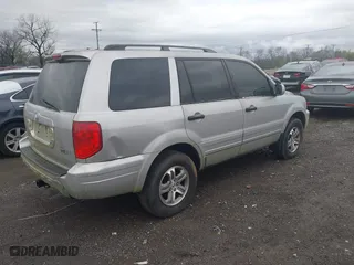 2003 Honda Pilot EX with VIN 2HKYF18533H604995, listed as a IAAI auction lot 41936058 with 205,848 mi miles. Bid and sale history available at carsss.com. Image 4.