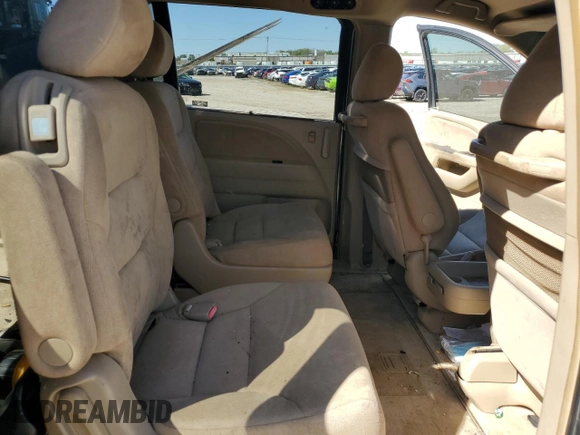 2005 Honda Odyssey EX z VIN 5FNRL38455B400474, wystawiony jako Copart lot #55845445 z przebiegiem Nie podano mil oraz Czysty tytuł • Clean title. Historia ofert i sprzedaży dostępna na DreamBid. Obrazek 11.