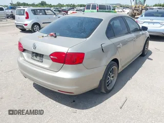 2013 Volkswagen Jetta S with VIN 3VW2K7AJ2DM290373, listed as a IAAI auction lot 42881516 with 101,220 mi miles and . Bid and sale history available at DreamBid. Image 4.