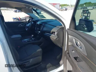 2021 Chevrolet Traverse LS with VIN 1GNERFKW0MJ240592, listed as a IAAI auction lot 42310680 with 59,986 mi miles and . Bid and sale history available at DreamBid. Image 5.
