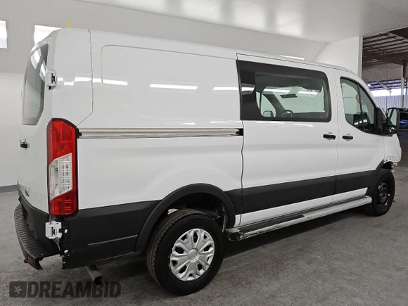 2023 Ford Transit Cargo with VIN 1FTBR1Y86PKB40356, listed as a Copart auction lot 45669345 with 12,890 mi miles and Salvage Title. Bid and sale history available at DreamBid. Image 3.