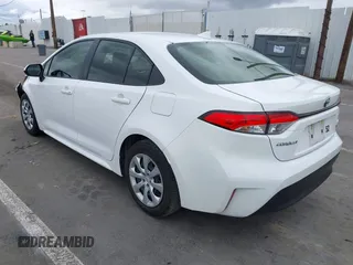 2023 Toyota Corolla Hybrid LE with VIN JTDBCMFE3PJ010097, listed as a IAAI auction lot 41786656 with 50,775 mi miles. Bid and sale history available at carsss.com. Image 3.