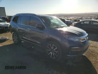 2019 Honda Pilot Touring 7-Passenger with VIN 5FNYF6H61KB060421, listed as a Copart auction lot 49460295 with 41,362 mi miles and Salvage Title. Bid and sale history available at DreamBid. Image 4.