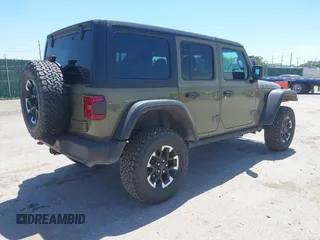 2025 Jeep Wrangler Rubicon with VIN 1C4PJXFN2SW527531, listed as a IAAI auction lot 42267227 with 8,022 mi miles and . Bid and sale history available at DreamBid. Image 4.