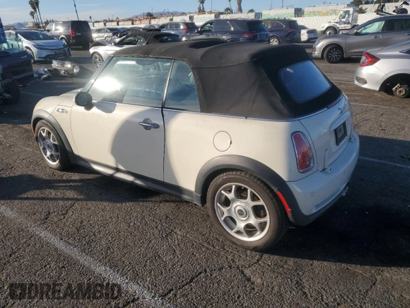 2007 MINI Convertible S with VIN WMWRH33567TL94957, listed as a Copart auction lot 42127775 with 90,401 mi miles and Salvage title. Bid and sale history available at DreamBid. Image 2.