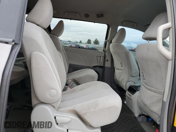 2014 Toyota Sienna LE with VIN 5TDJK3DC7ES073648, listed as a Copart auction lot 50554095 with 136,236 mi miles and Salvage Title. Bid and sale history available at DreamBid. Image 11.