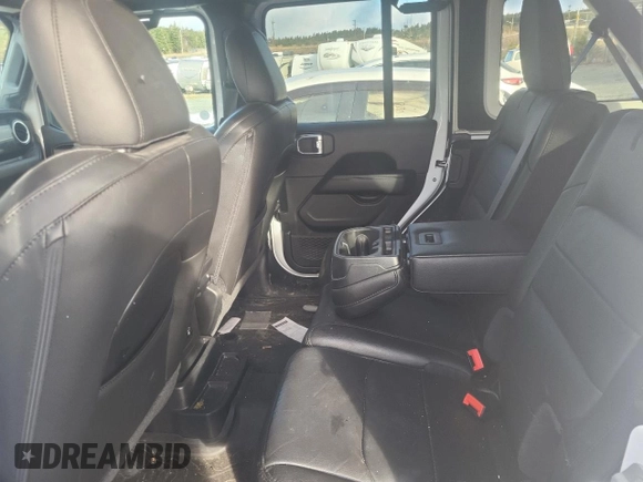 2023 Jeep Wrangler Sahara with VIN 1C4HJXEN4PW588585, listed as a Copart auction lot 86566484 with 38,020 mi miles and Salvage Title. Bid and sale history available at carsss.com. Image 11.