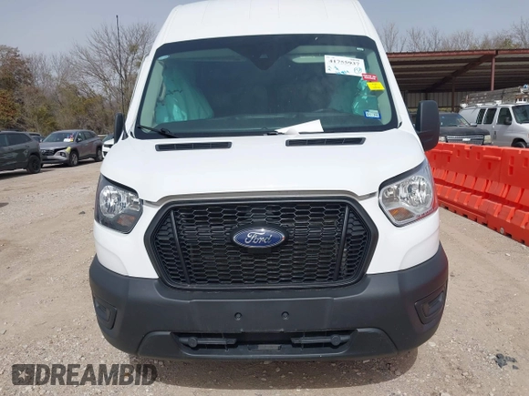 2023 Ford Transit Cargo z VIN 1FTBR3X83PKA69906, wystawiony jako IAAI lot #41755937 z przebiegiem 35 484 mil mil oraz . Historia ofert i sprzedaży dostępna na DreamBid. Obrazek 12.