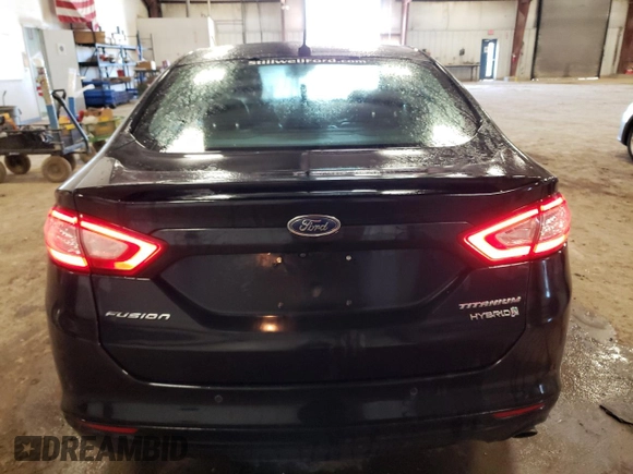 2014 Ford Fusion Titanium Hybrid z VIN 3FA6P0RUXER168706, wystawiony jako Copart lot #55362295 z przebiegiem 136 382 mil mil oraz Czysty tytuł • Clean title. Historia ofert i sprzedaży dostępna na DreamBid. Obrazek 6.