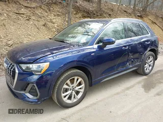 2021 Audi Q3 S line Premium with VIN WA1DECF31M1031368, listed as a IAAI auction lot 42133396 with 50,148 mi miles and . Bid and sale history available at DreamBid. Image 2.