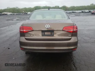 2015 Volkswagen Jetta SE z VIN 3VWD17AJ1FM422960, wystawiony jako Copart lot #55860335 z przebiegiem 87 616 mil mil oraz Czysty tytuł • Clean title. Historia ofert i sprzedaży dostępna na DreamBid. Obrazek 6.