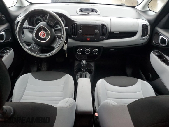 2014 FIAT 500L Easy with VIN ZFBCFABH3EZ028210, listed as a Copart auction lot 83995984 with Not Provided miles and Salvage Title. Bid and sale history available at DreamBid. Image 8.