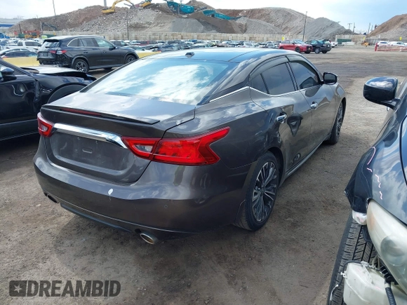 2016 Nissan Maxima SV with VIN 1N4AA6AP0GC904168, listed as a IAAI auction lot 41865822 with 121,999 mi miles and . Bid and sale history available at DreamBid. Image 4.