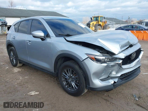 2020 Mazda CX-5 Touring with VIN JM3KFACM5L0768371, listed as a IAAI auction lot 41862623 with 138,446 mi miles and . Bid and sale history available at carsss.com. Image 1.