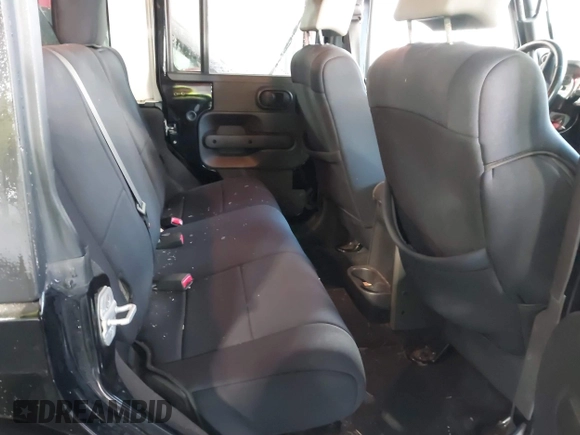 2008 Jeep Wrangler Unlimited Rubicon with VIN 1J8GA69108L562705, listed as a IAAI auction lot 41306923 with 150,002 mi miles and . Bid and sale history available at DreamBid. Image 8.