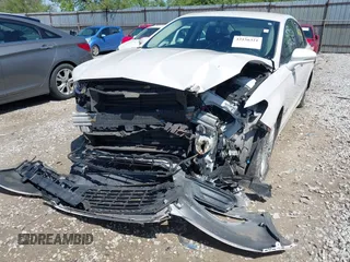 2013 Ford Fusion SE Hybrid z VIN 3FA6P0LU9DR349321, wystawiony jako IAAI lot #42156321 z przebiegiem 90 688 mil mil oraz . Historia ofert i sprzedaży dostępna na DreamBid. Obrazek 6.