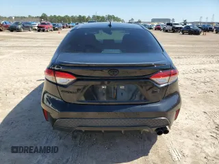 2022 Toyota Corolla SE with VIN 5YFS4MCE7NP126008, listed as a Copart auction lot 46907645 with 26,999 mi miles and Salvage Title. Bid and sale history available at DreamBid. Image 6.