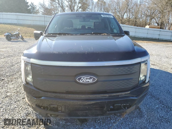 2024 Ford F-150 Lightning XLT with VIN 1FTVW3LK1RWG18473, listed as a Copart auction lot 86523084 with 6,824 mi miles and Salvage title. Bid and sale history available at DreamBid. Image 5.