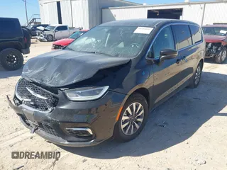 2023 Chrysler Pacifica Hybrid Touring L with VIN 2C4RC1L75PR611901, listed as a IAAI auction lot 41510935 with 44,156 mi miles and . Bid and sale history available at DreamBid. Image 2.